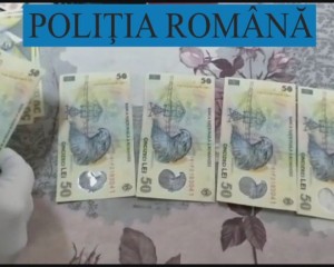 FOST PROCUROR, REŢINUT DE POLIŢIŞTI. A FOST PRINS ÎNCERCÂND SĂ PLASEZE BANI FALŞI